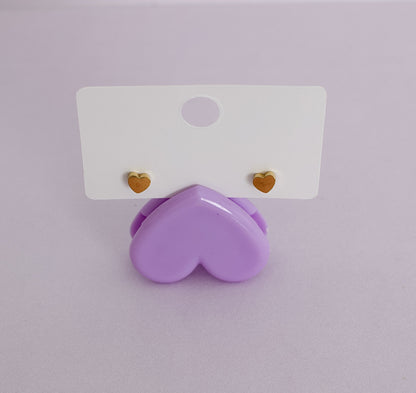  A pair of hypoallergenic heart shaped screwbacks for stud earrings from The Pierced Peanut.
