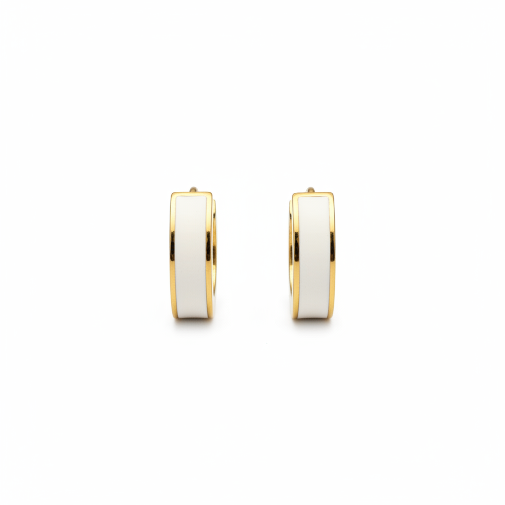 White flat huggie earrings on white background