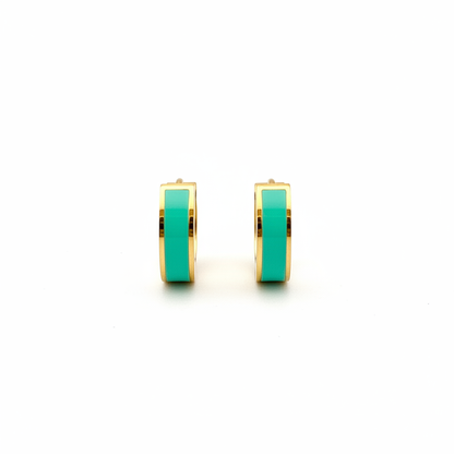 Aqua green huggie earrings on white background from the Pierced Peanut earring company in nz.
