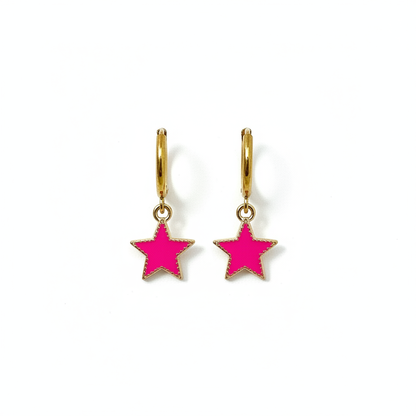 Pink star huggie earrings on white background